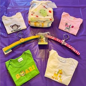 Set of 10 Safari Theme BABY ITEMS: A Blanket, 4 hangers, a candle, 4 tops